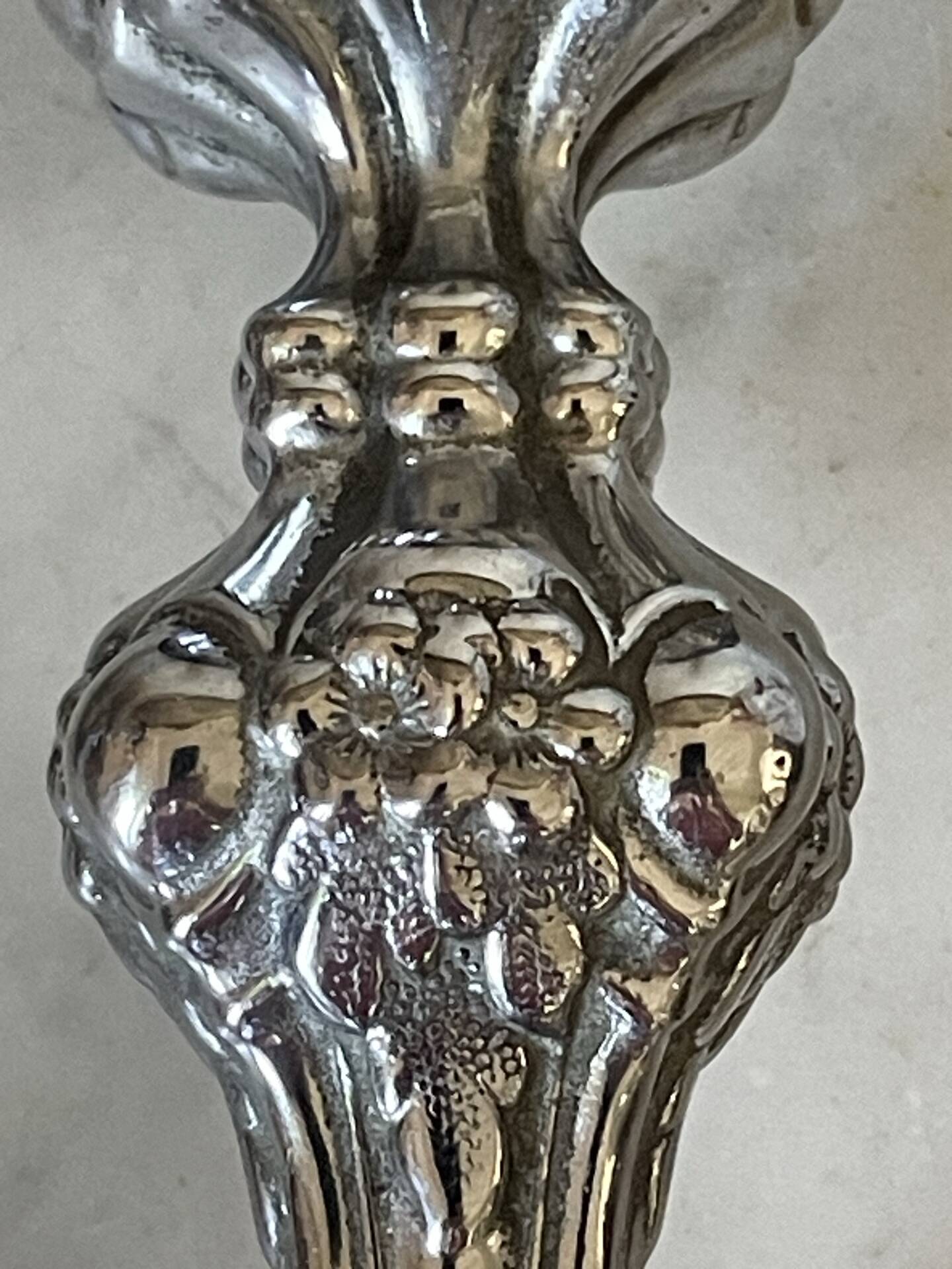 Pair of rococo silver-plated candlesticks