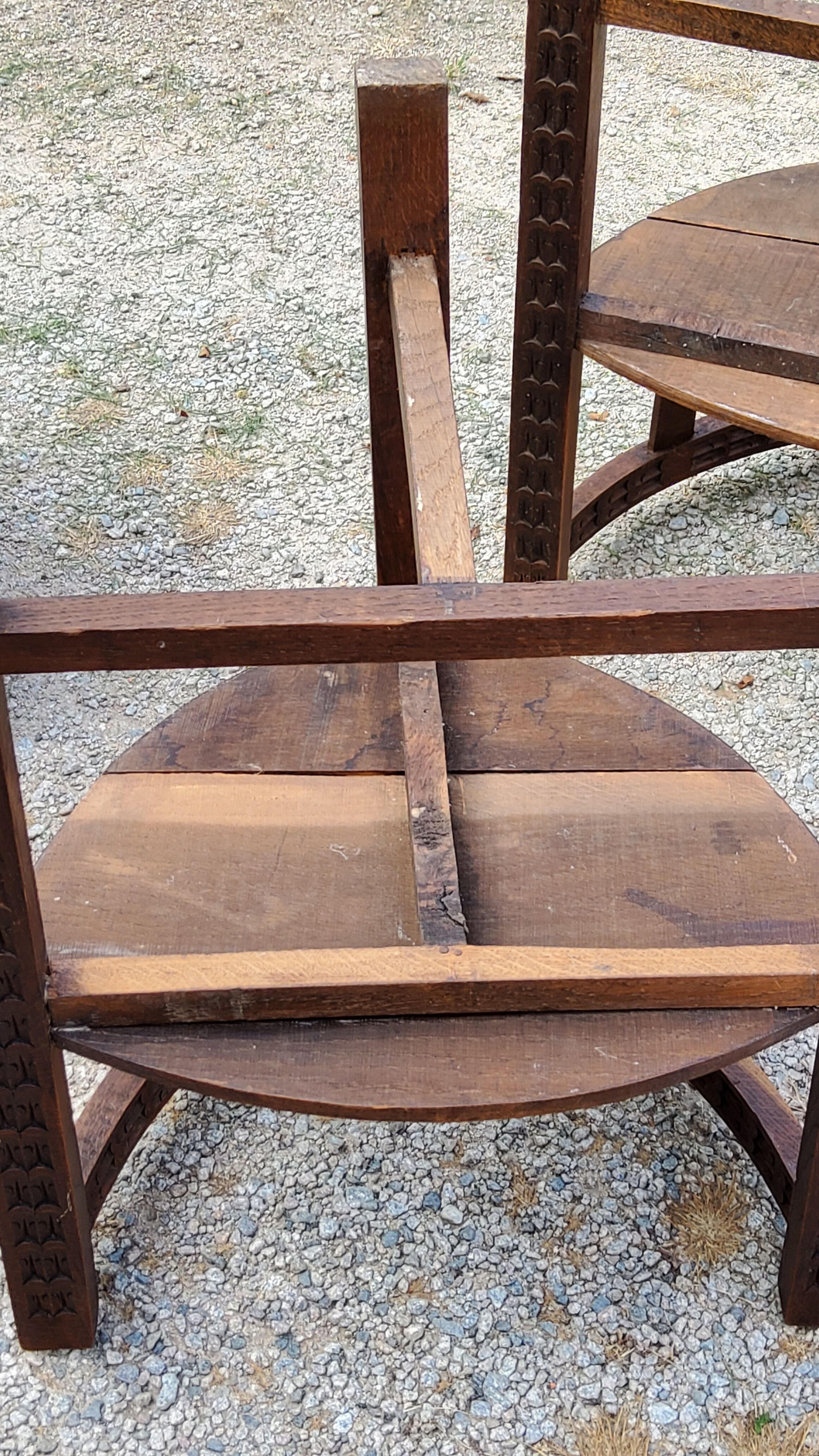 Set of three brutalist tripod armchairs in carved solid oak