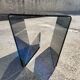 Table basse porte livres en verre 1970