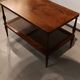 Coffee table / side table in mahogany with a rattan shelf.
