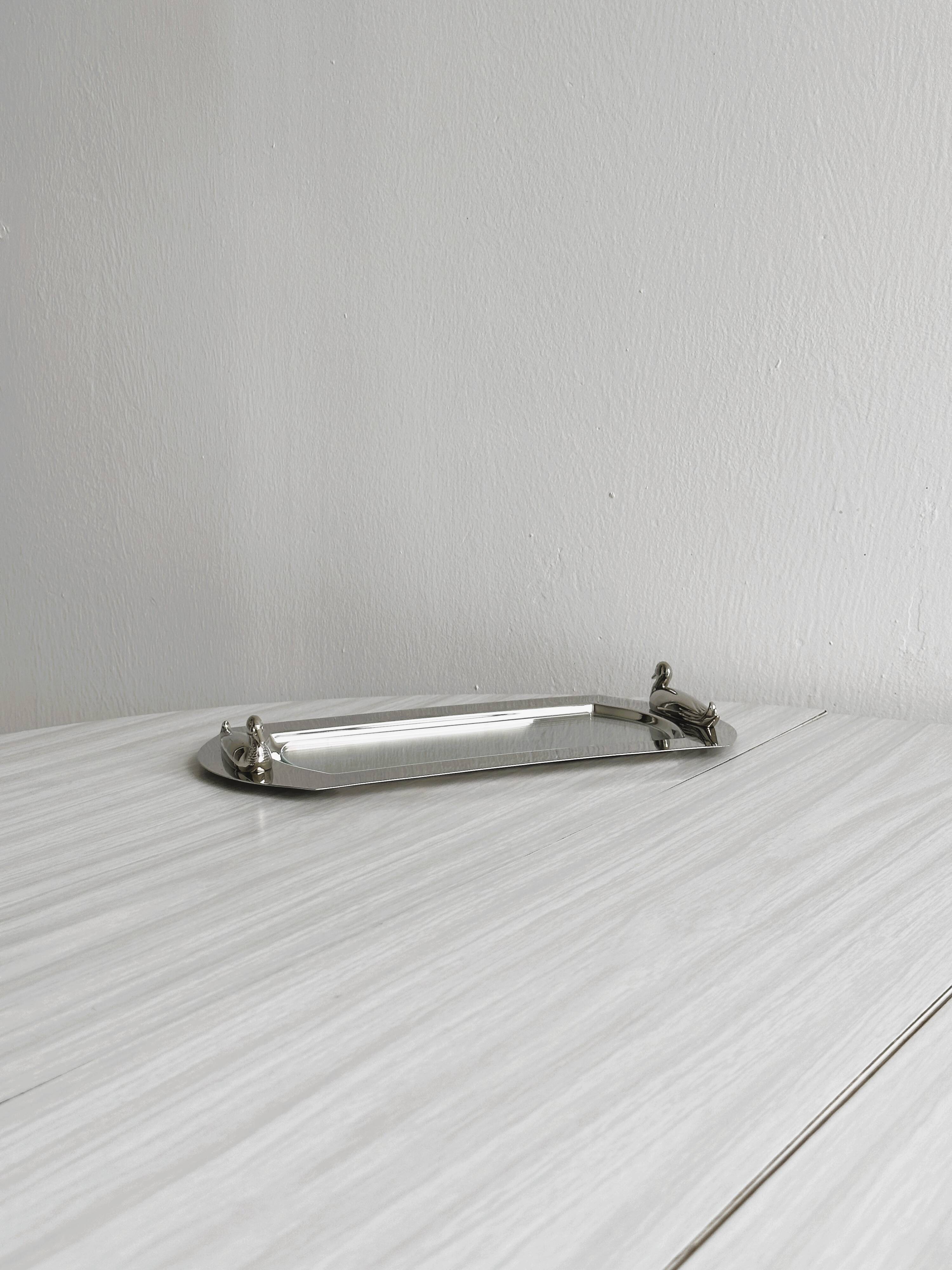 Shiny metal foie gras dish