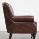Fauteuil Chesterfield classique en cuir de vachette grainé couleur cognac