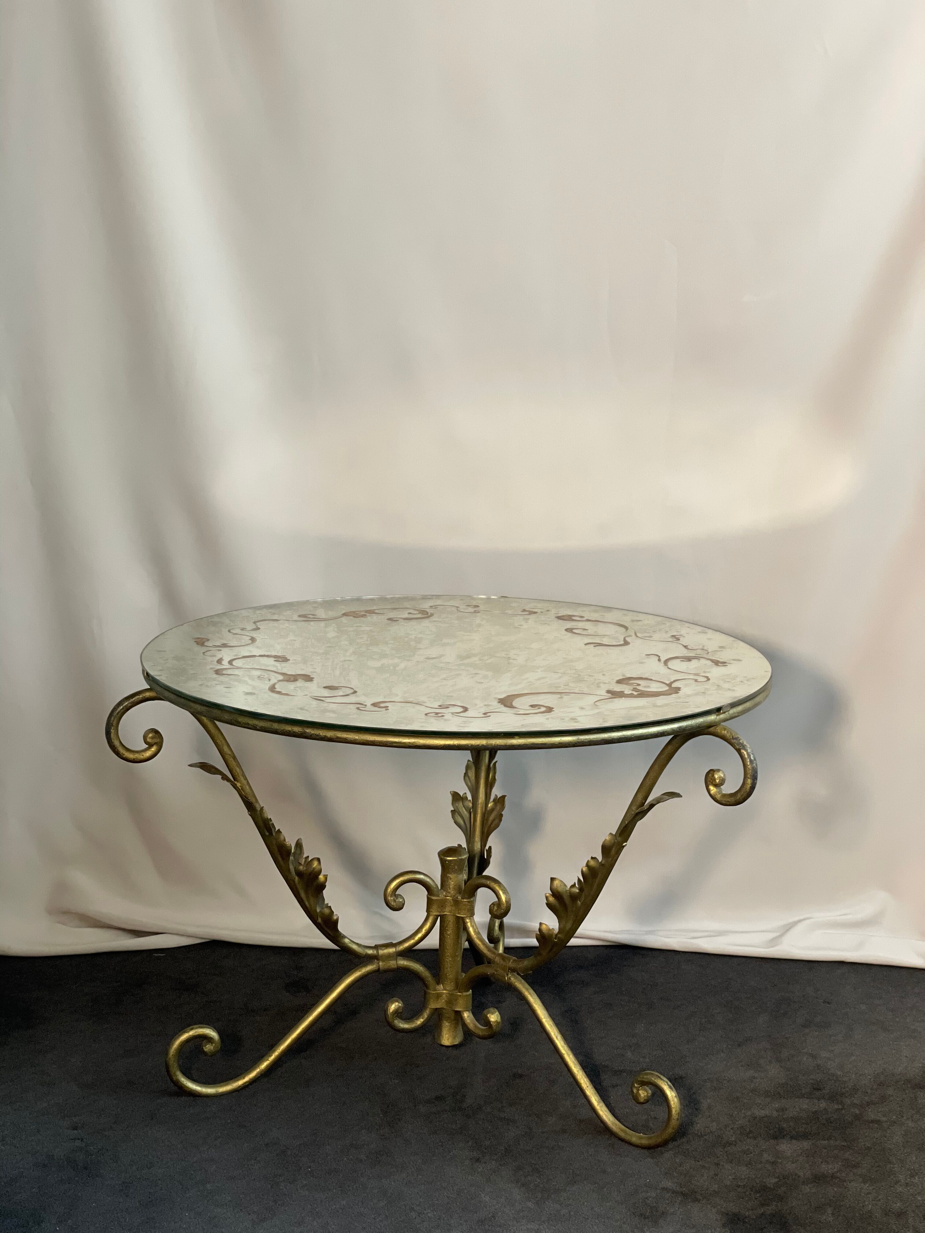 Round coffee table base in gilded wrought iron beautiful top enamelled glass 50s