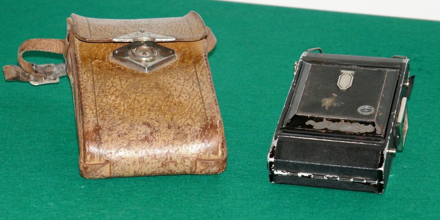 Vintage bellows camera with leather case