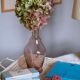 Blown glass vase moves purple