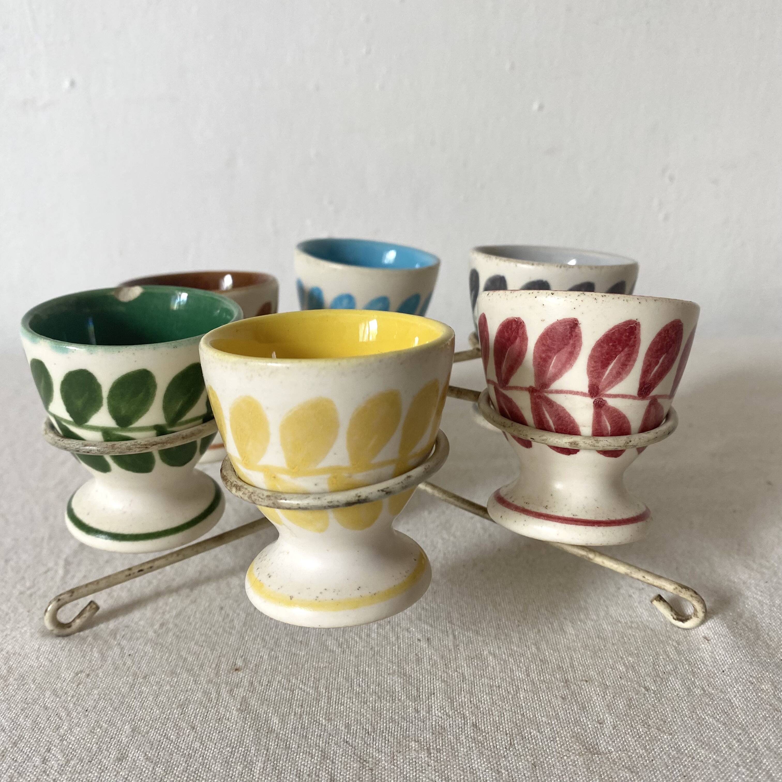 Antique earthenware egg cups