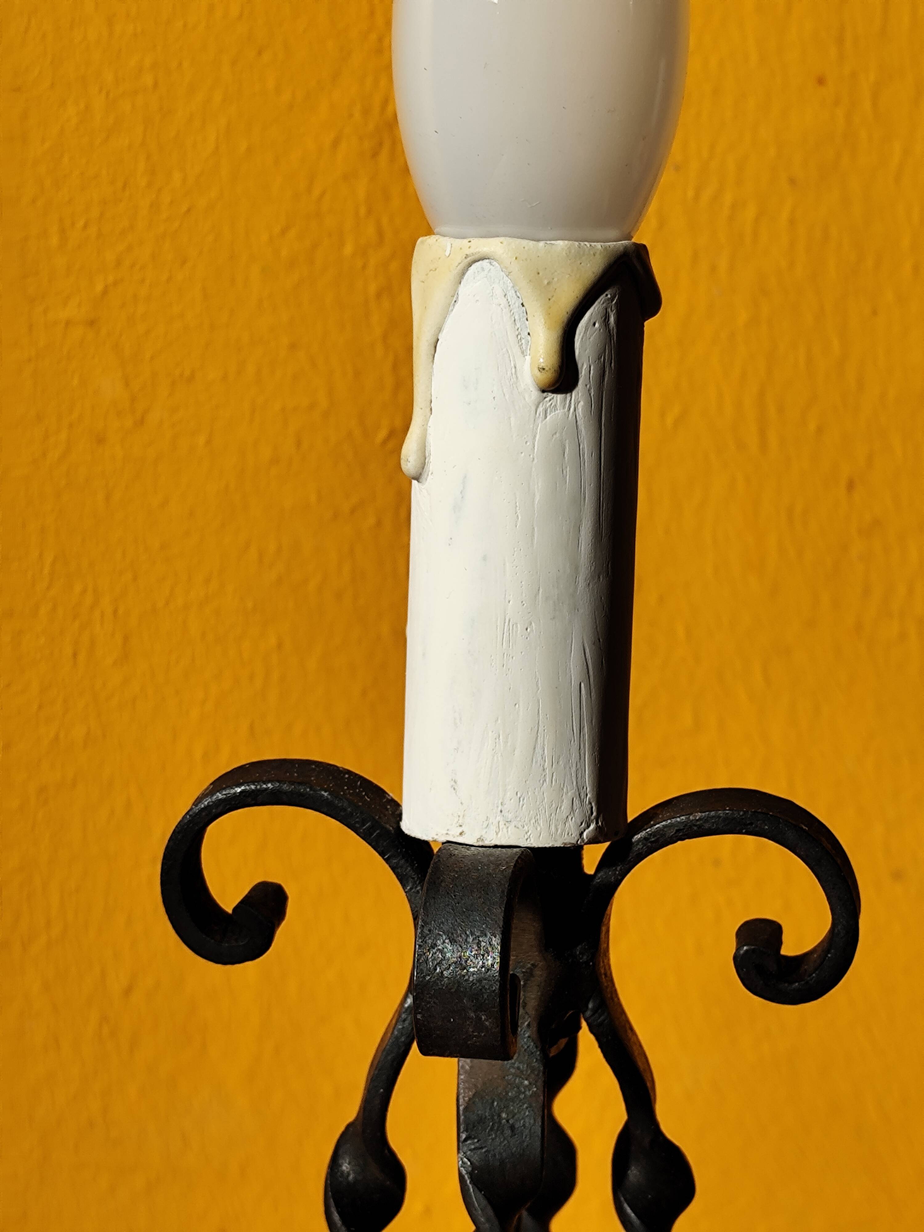 Old metal lamp and fake candle