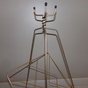 Vintage magazine holder in gold metal