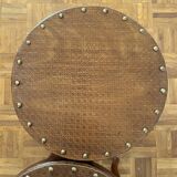 2 antique bistro stools with curved wood and caning effect.