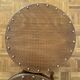 2 antique bistro stools with curved wood and caning effect.