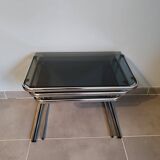 Set of 3 nesting tables with chrome metal legs and smoked glass from the 70s