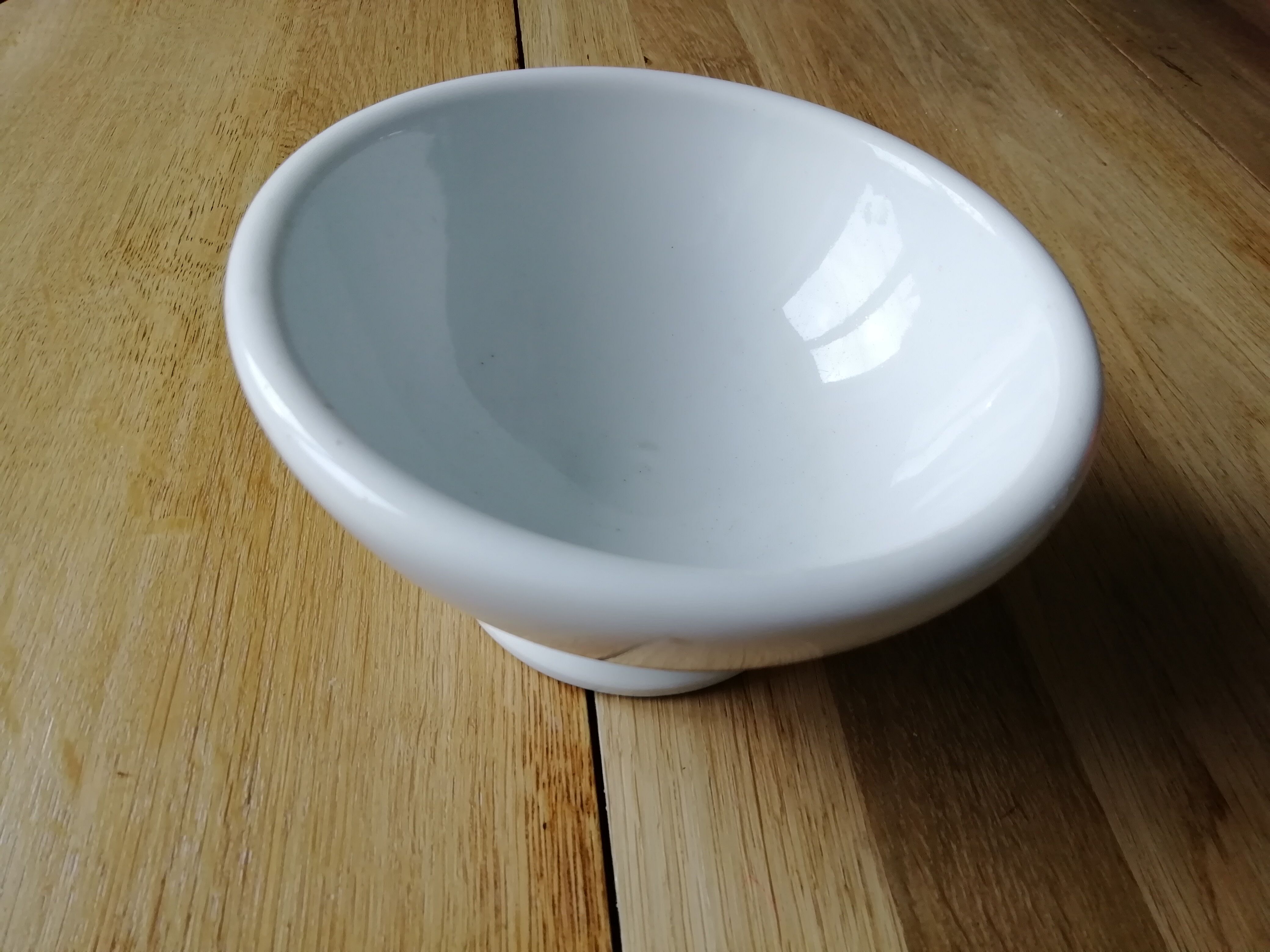 Old white bowl