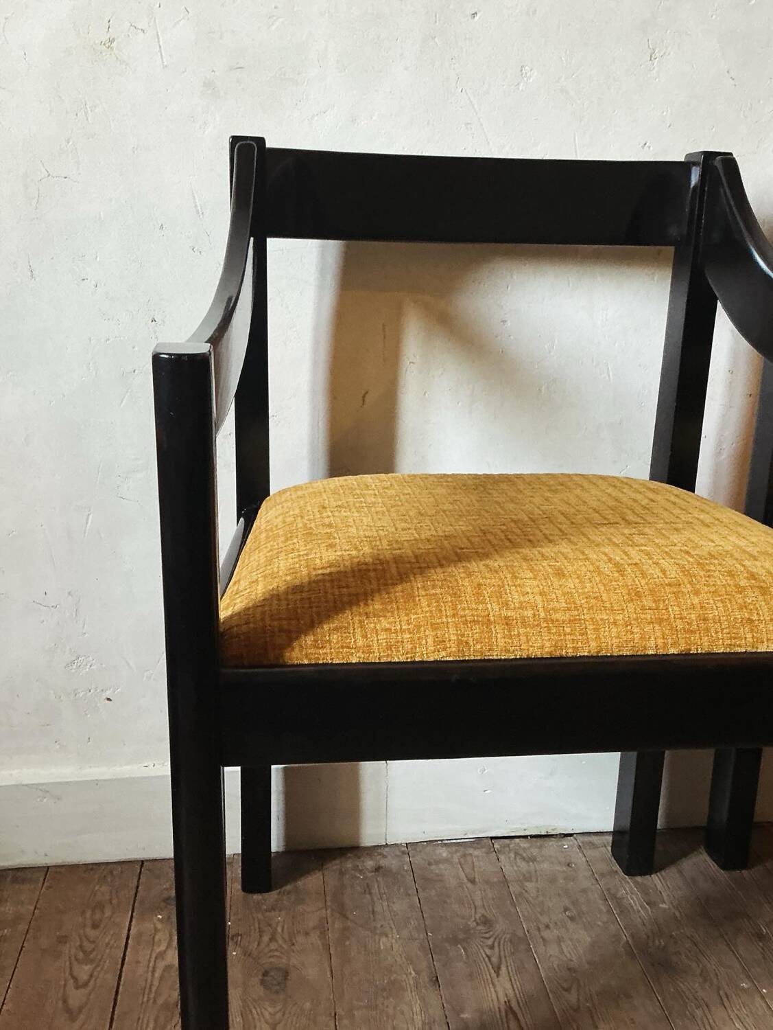 Four designer armchairs