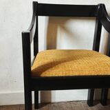 Four designer armchairs