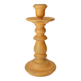 Vintage candle holder in weathered yellow wood
