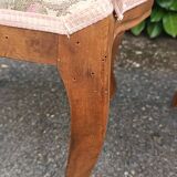 Pair of Louis XV chairs in carved walnut.