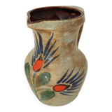 Ceramic pitcher with floral motif signed Saint Clément