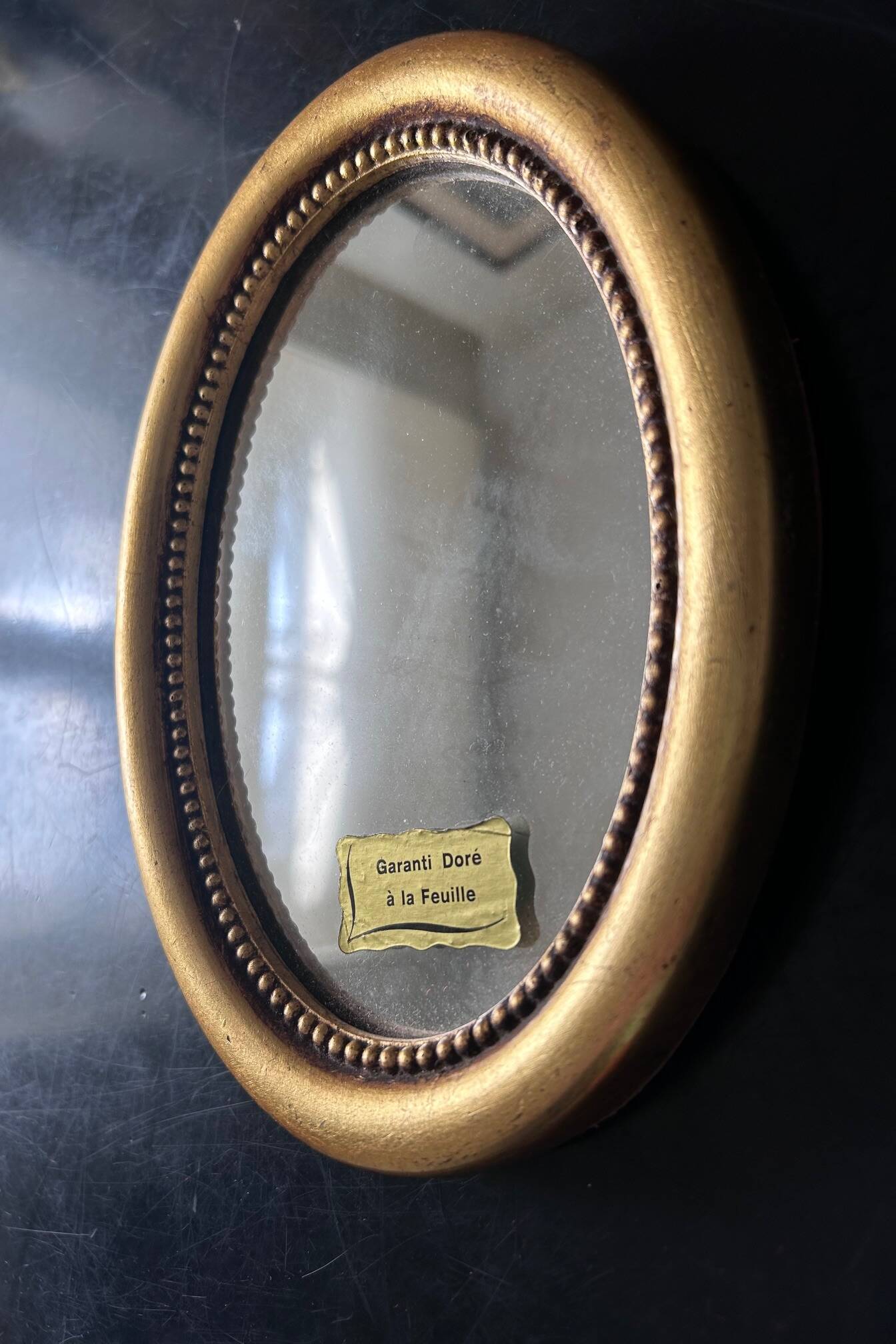 old mirror gilded with fine gold