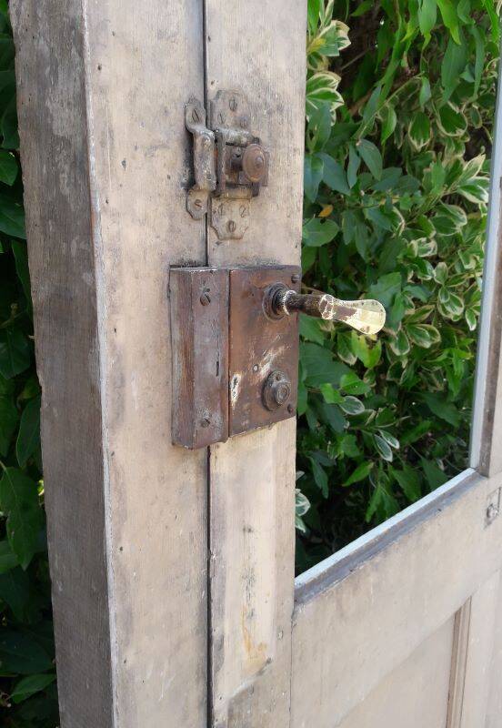 Old glazed door 211.5x105.5cm and its entrance door frame.