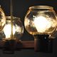 Scandinavian chandelier in mahogany wood and brass
