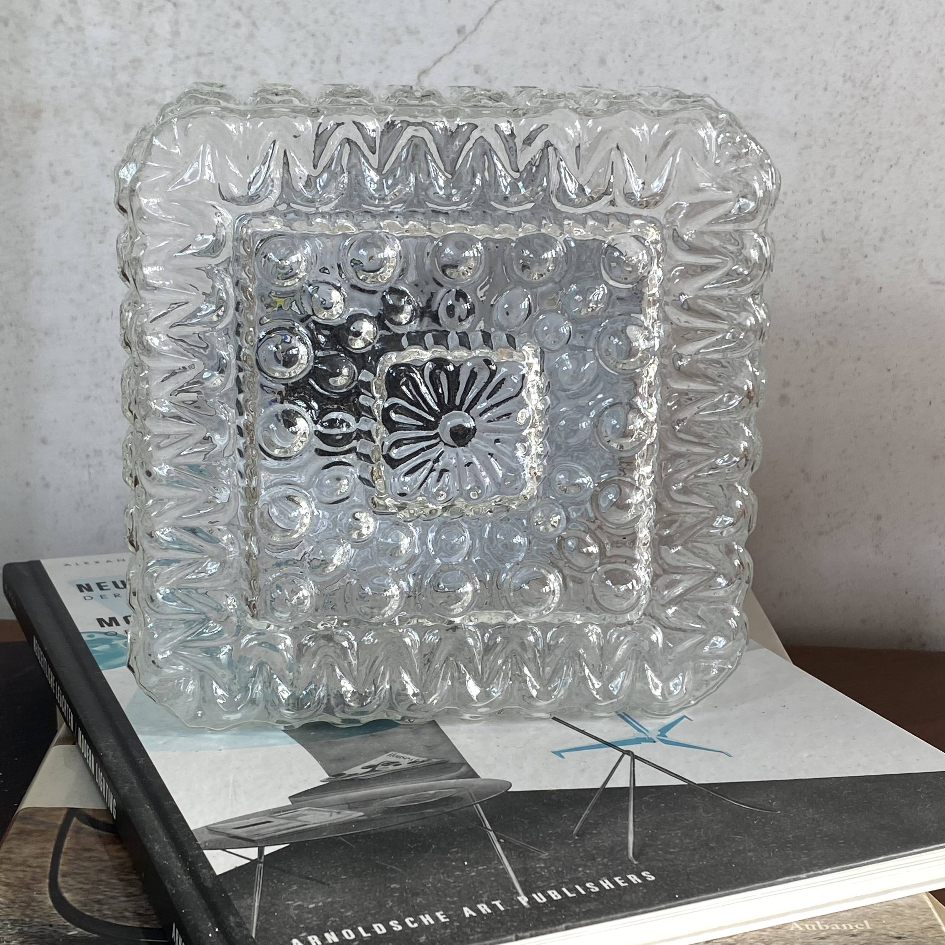 Small square wall light or ceiling light in transparent glass, 18 cm.