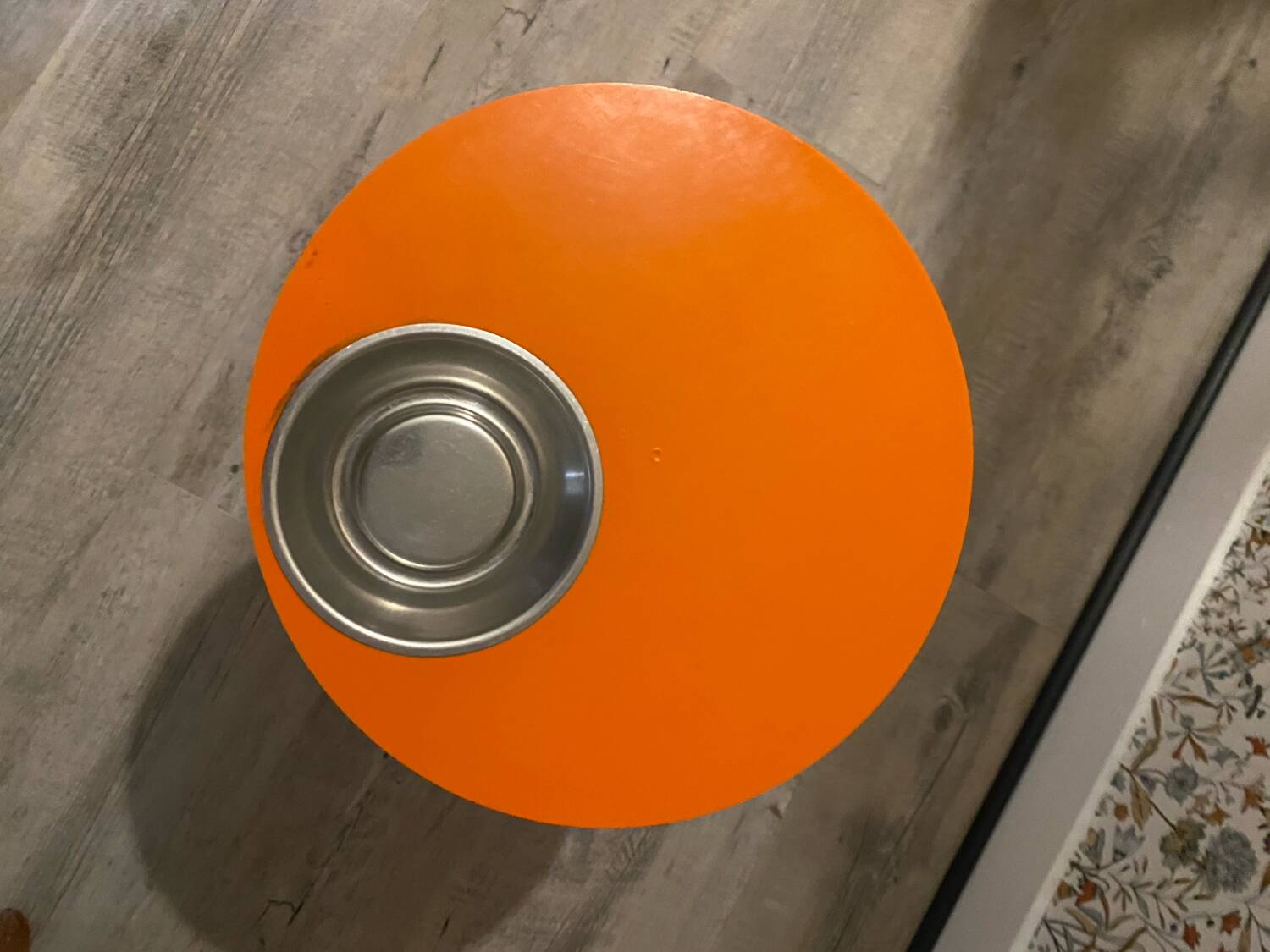 Orange tam-tam by Stamp with integrated pocket.