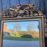 Louis XVI mirror in carved and gilded wood, 18th century
