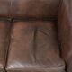 Set of a smooth chesterfield sofa and armchair with a timeless English look
