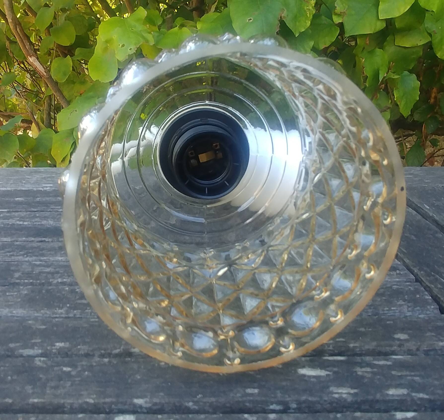 A 70s-vintage amber molded glass "bubble" pendant/lamp