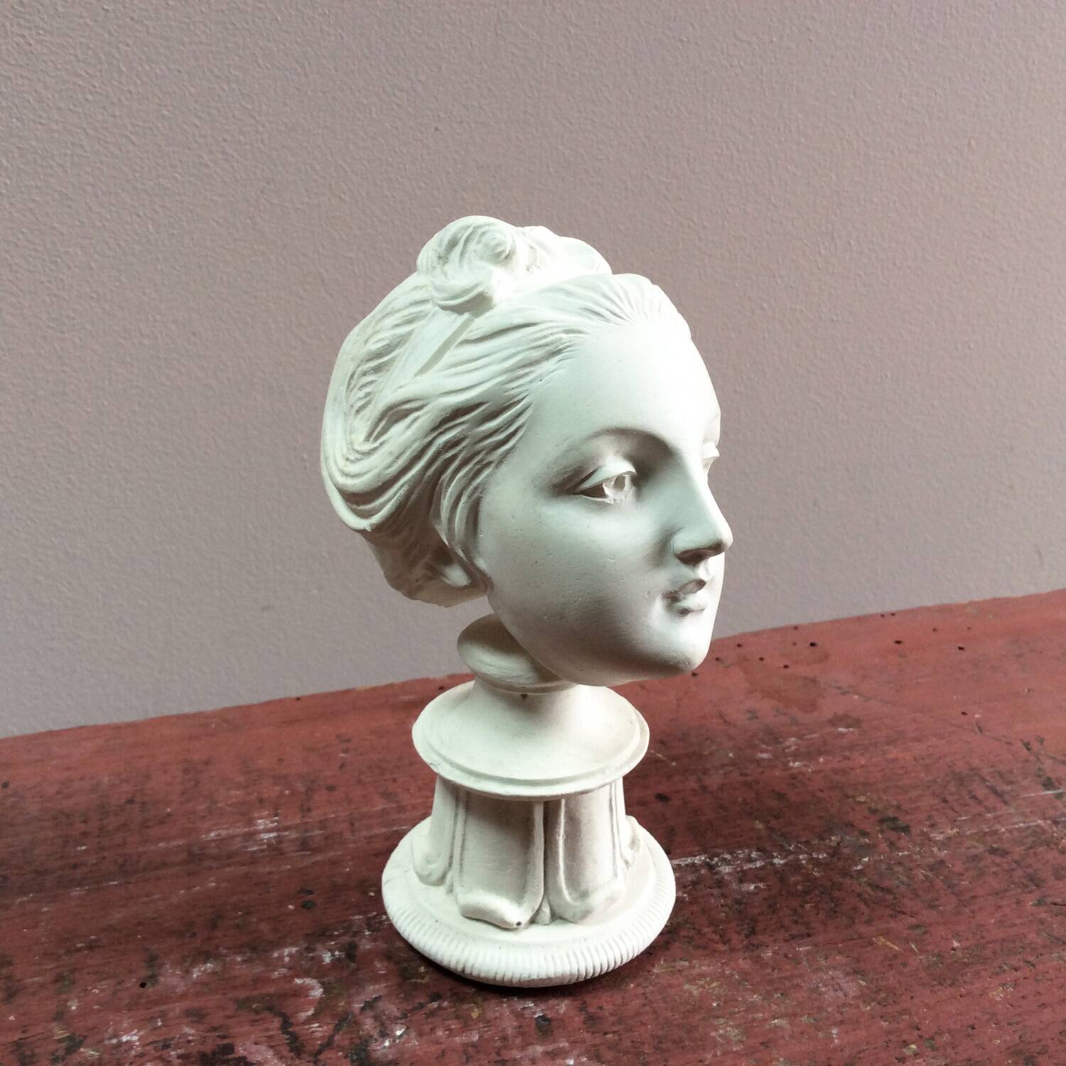 Plaster sculpture young woman with headband 1910