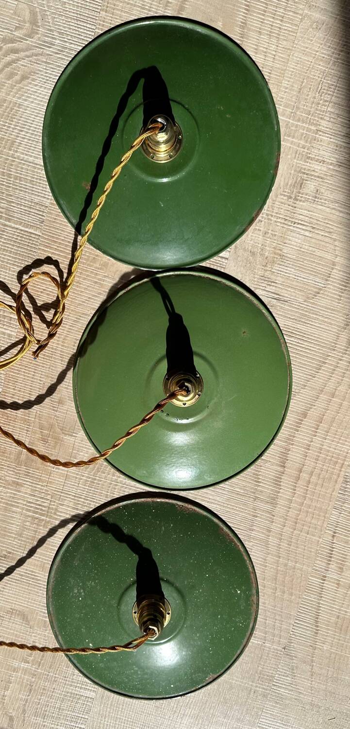 Trio of vintage green enamelled sheet metal lampshade pendants