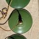 Trio of vintage green enamelled sheet metal lampshade pendants
