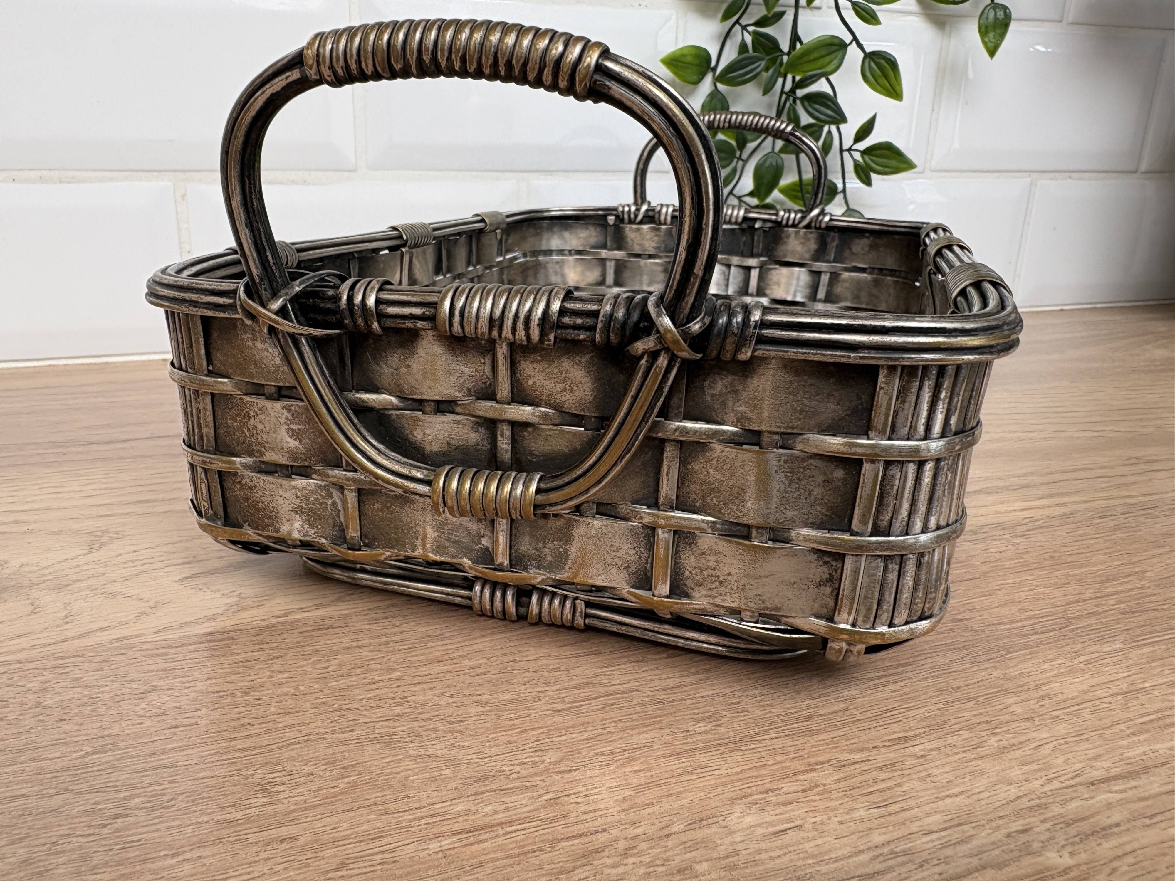 Woven silver-plated metal basket.
