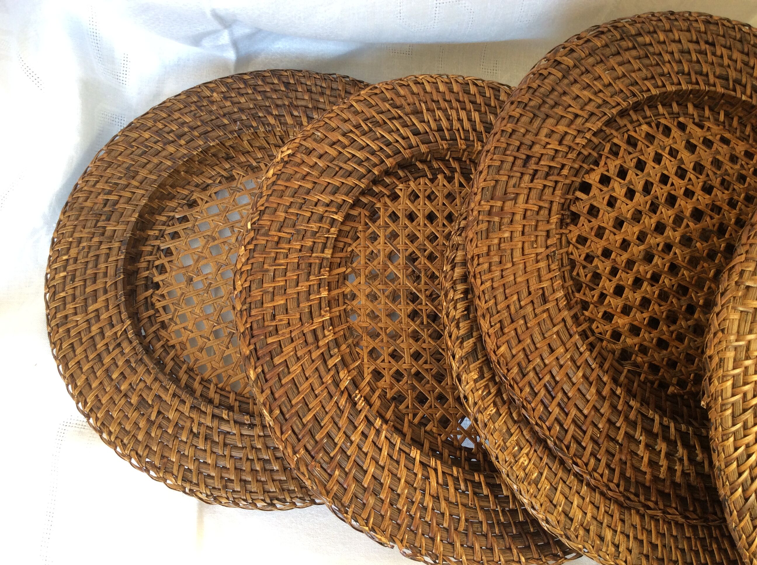 Six rattan under-plates, basketry, wicker