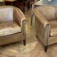 pair of camel leather club armchairs