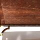 Italian rolling dessert table with two trays decorated with pink travertine