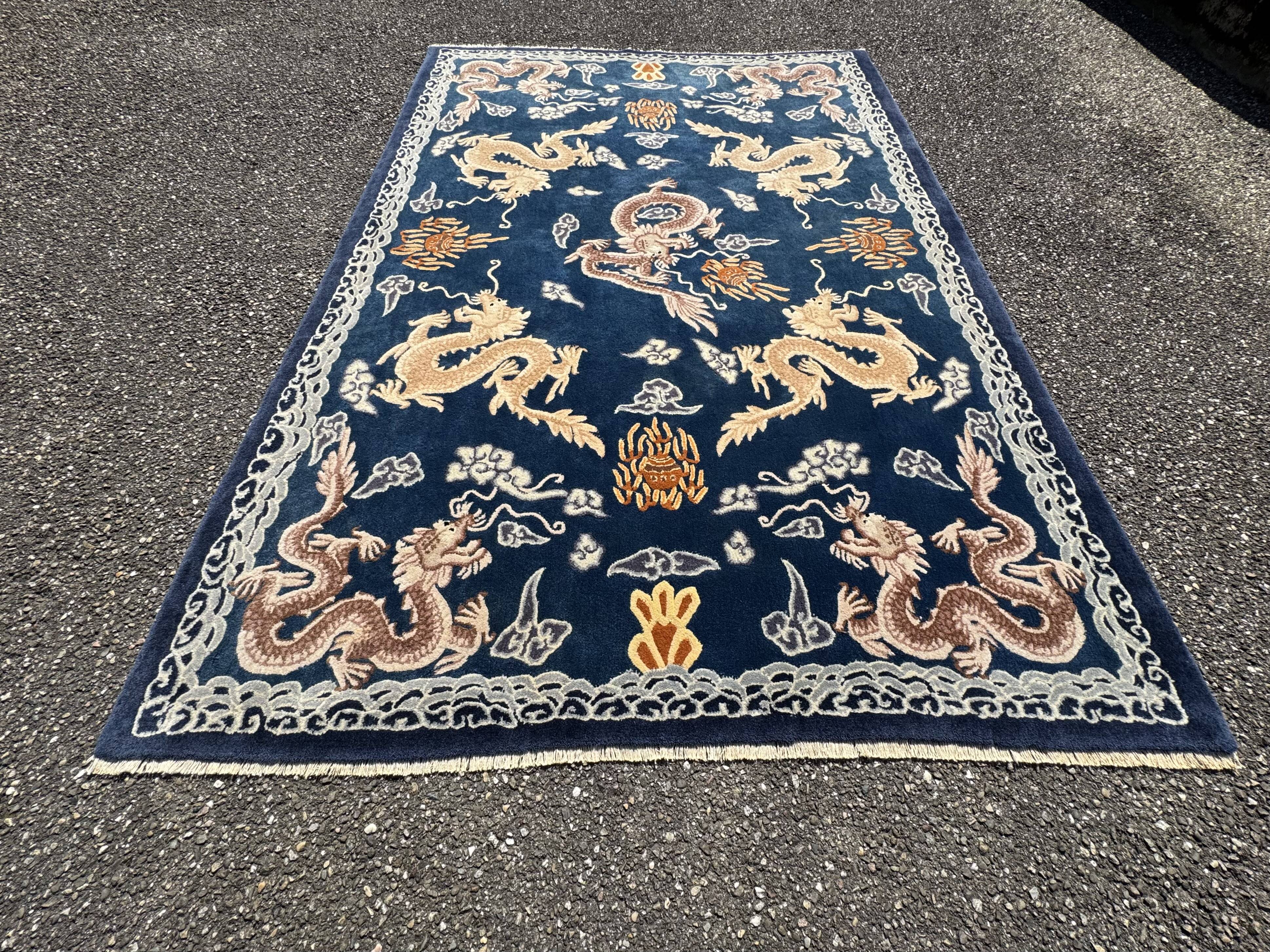 Chinese rug with dragon decoration. 230x165 cm