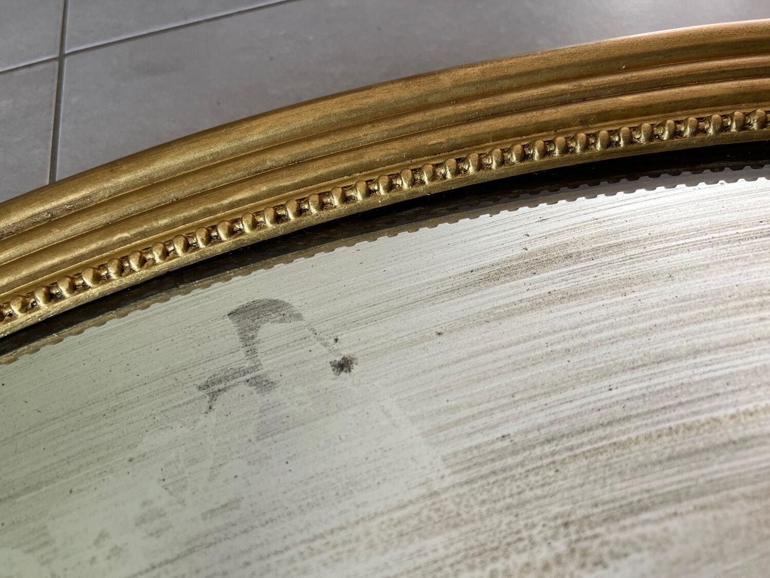 Vintage oval gold mirror