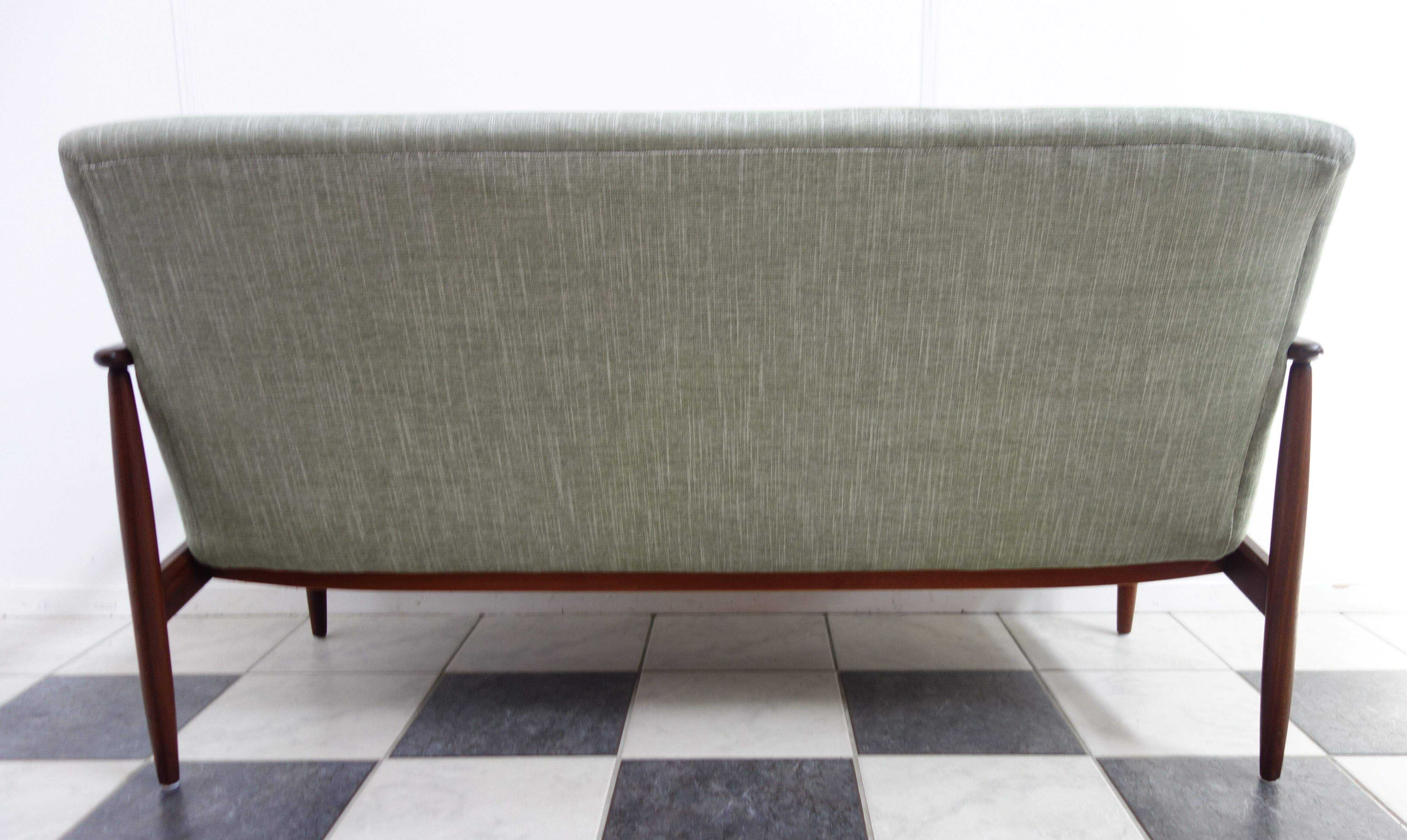 Danish teak 2 seat sofa green upholstery