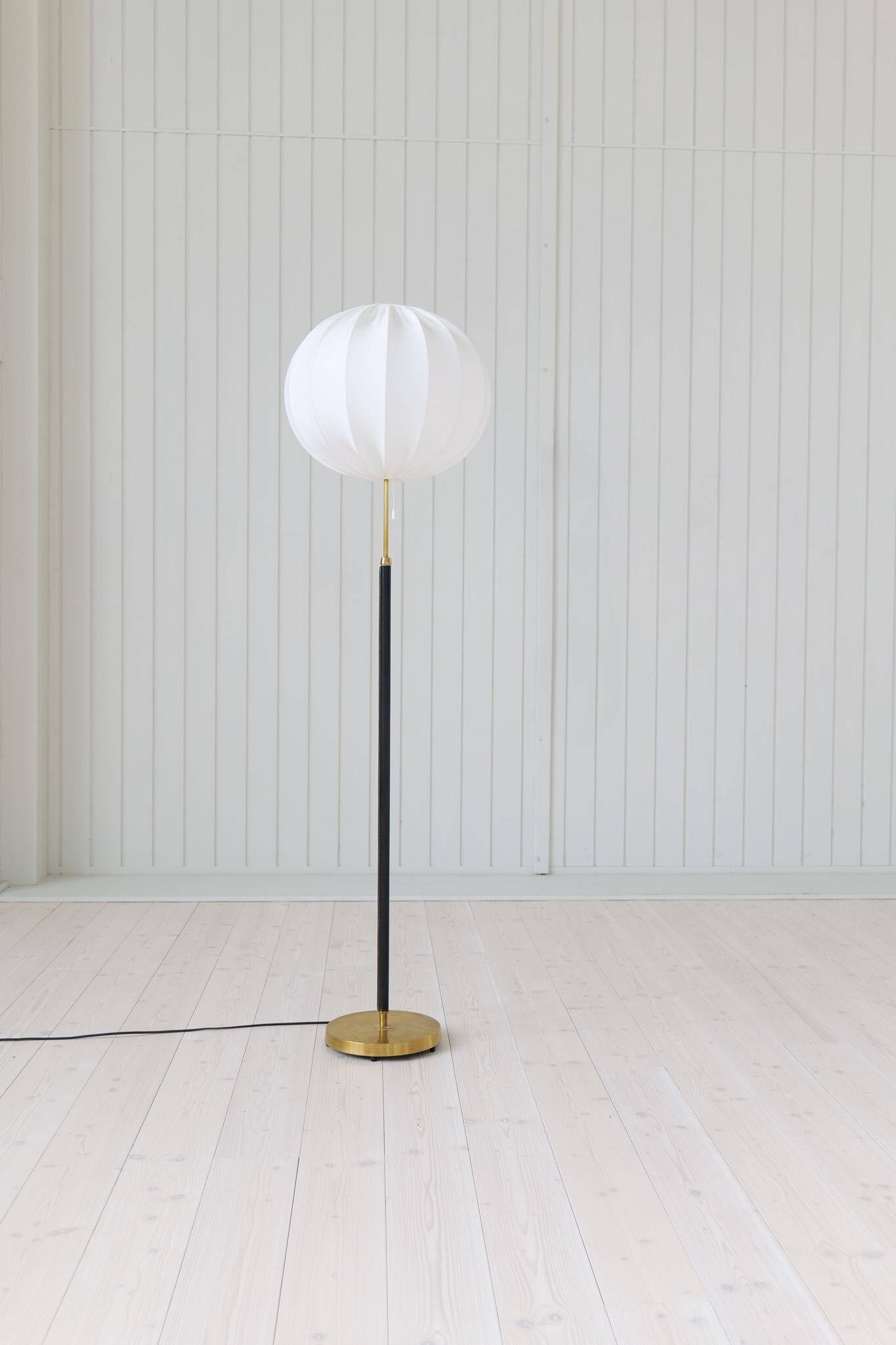 Mid-century black leather floor lamp by Falkenbergs Belysning, Sweden, 1960s.