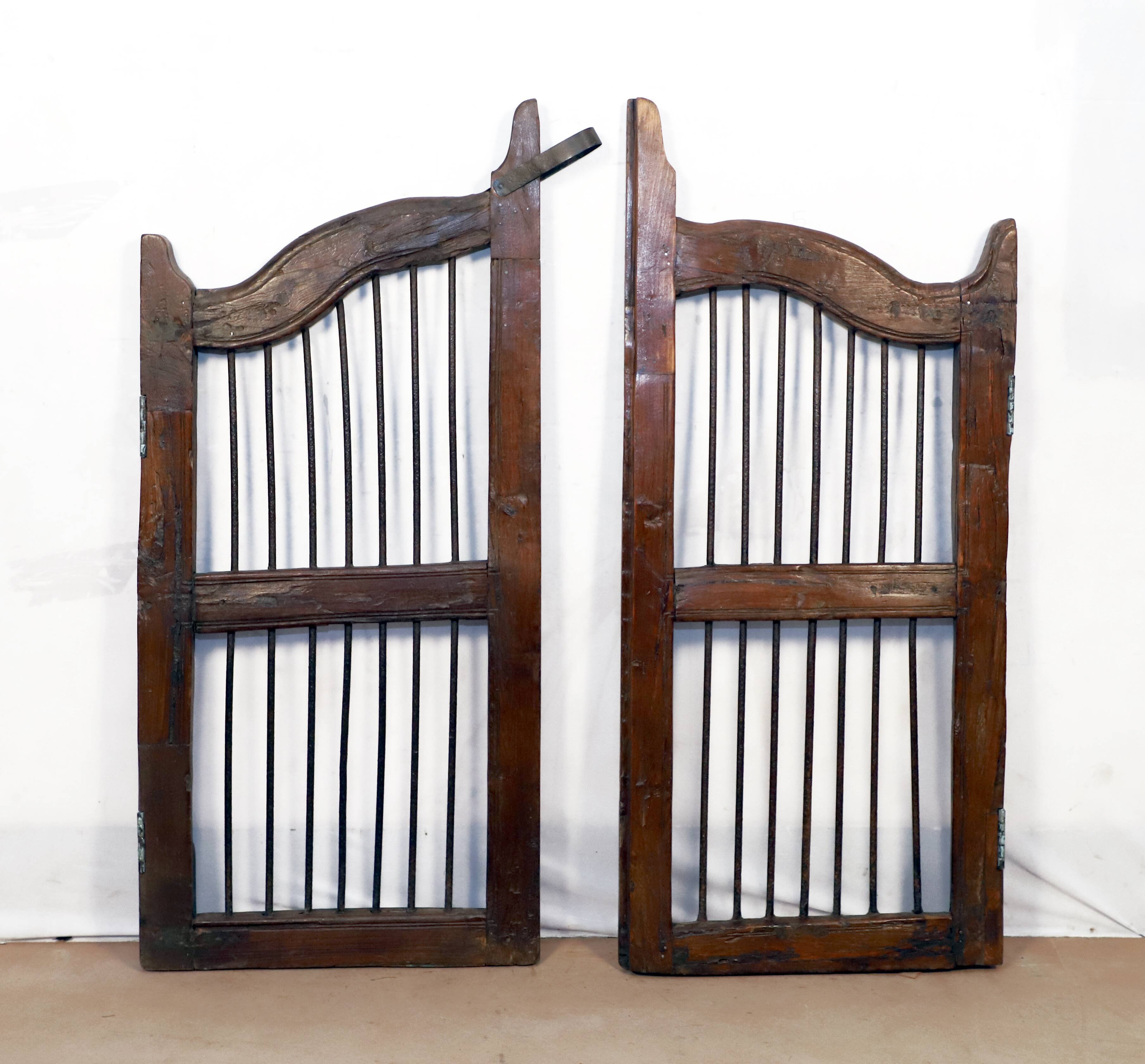 Old Burmese teak gate with openwork wrought iron panels