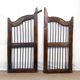 Old Burmese teak gate with openwork wrought iron panels