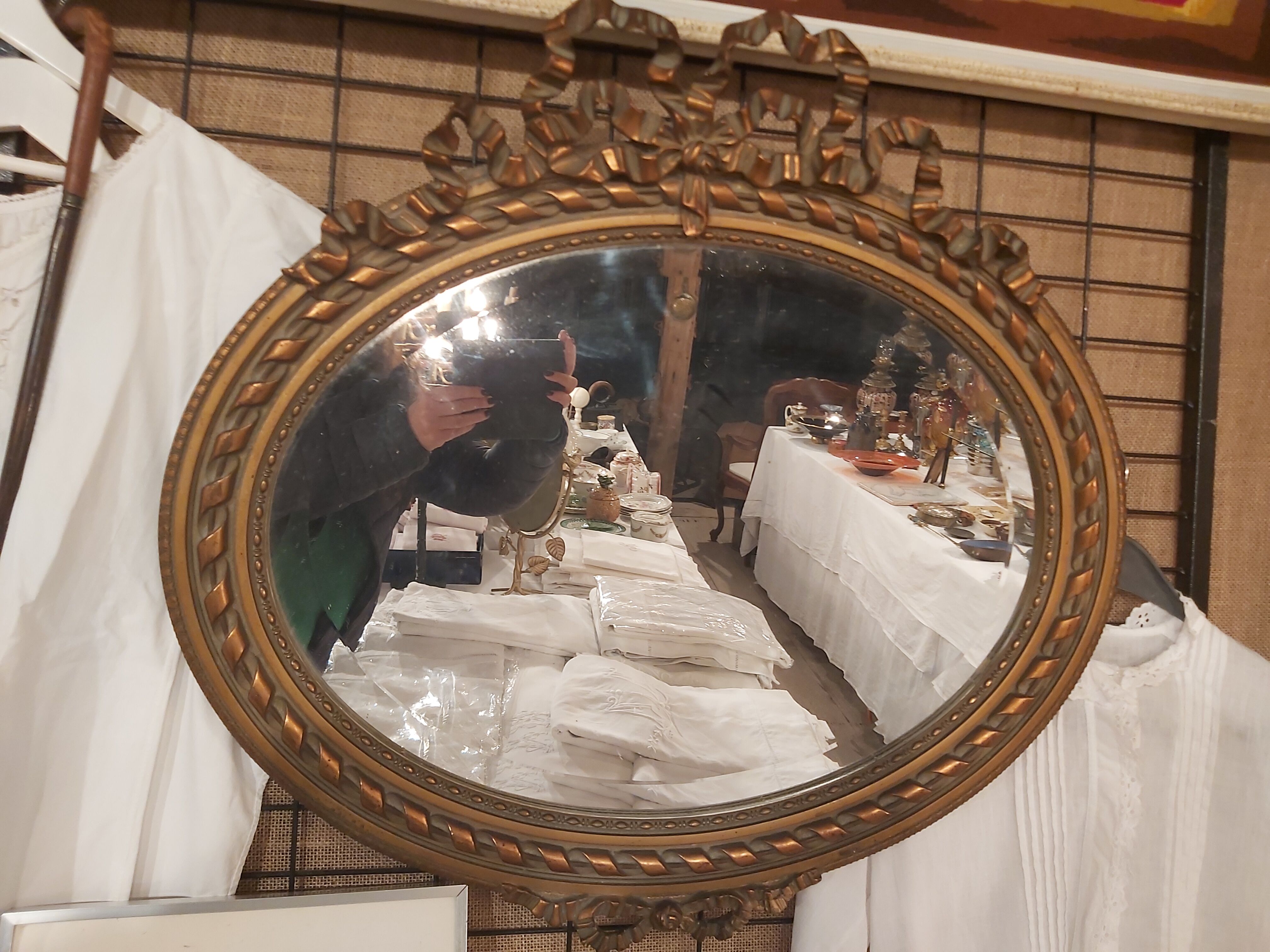 Louis XVI style oval beveled mirror