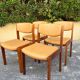 4 Scandinavian chairs in Baumann style made of solid wood and beige leather, 1960.