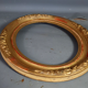 Oval frame nineteenth century gilded stucco wood and glass 36x31 foliage 28x23 cm