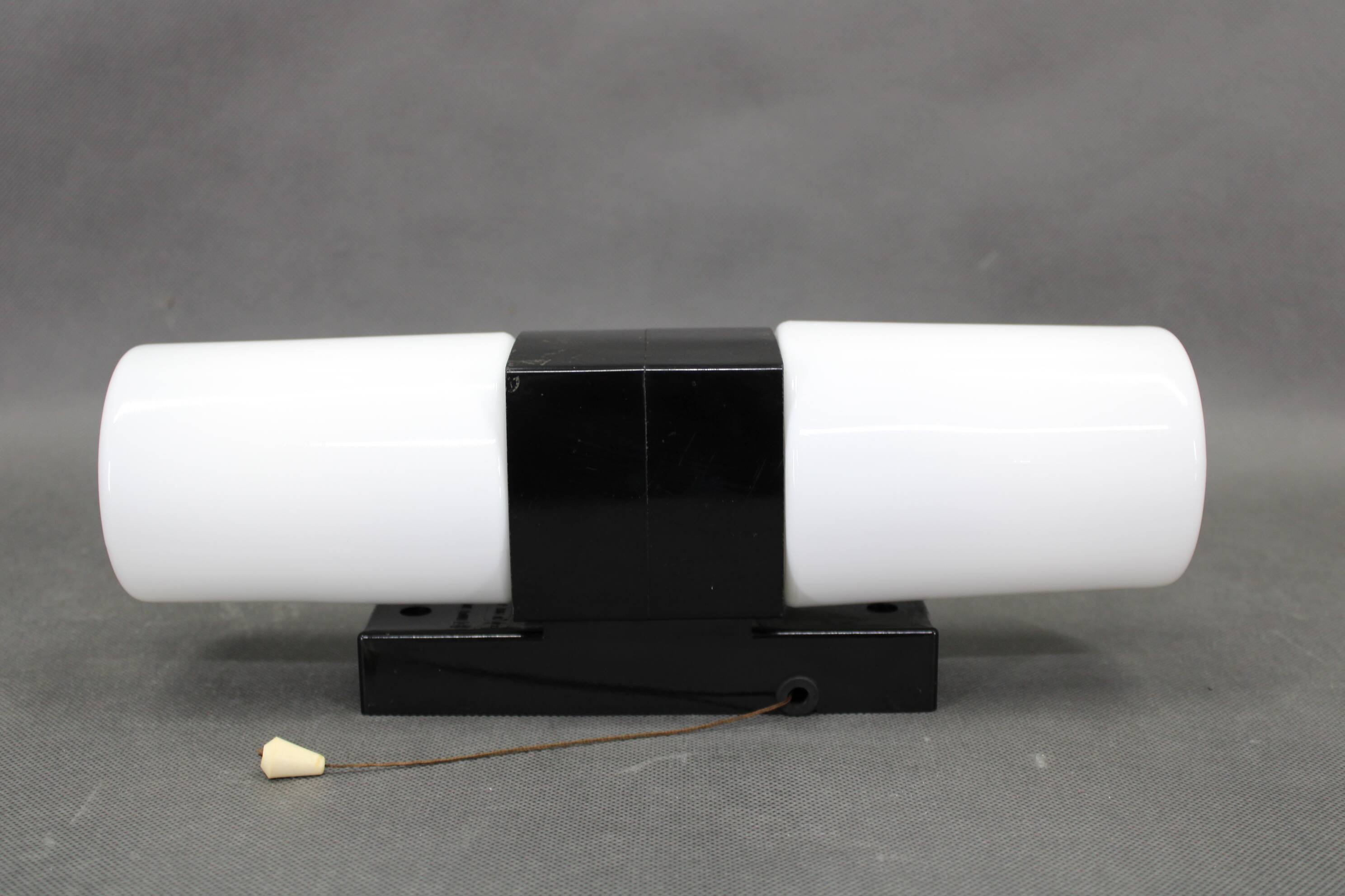 Mid-century wall light in bakelite and glass, 1960s