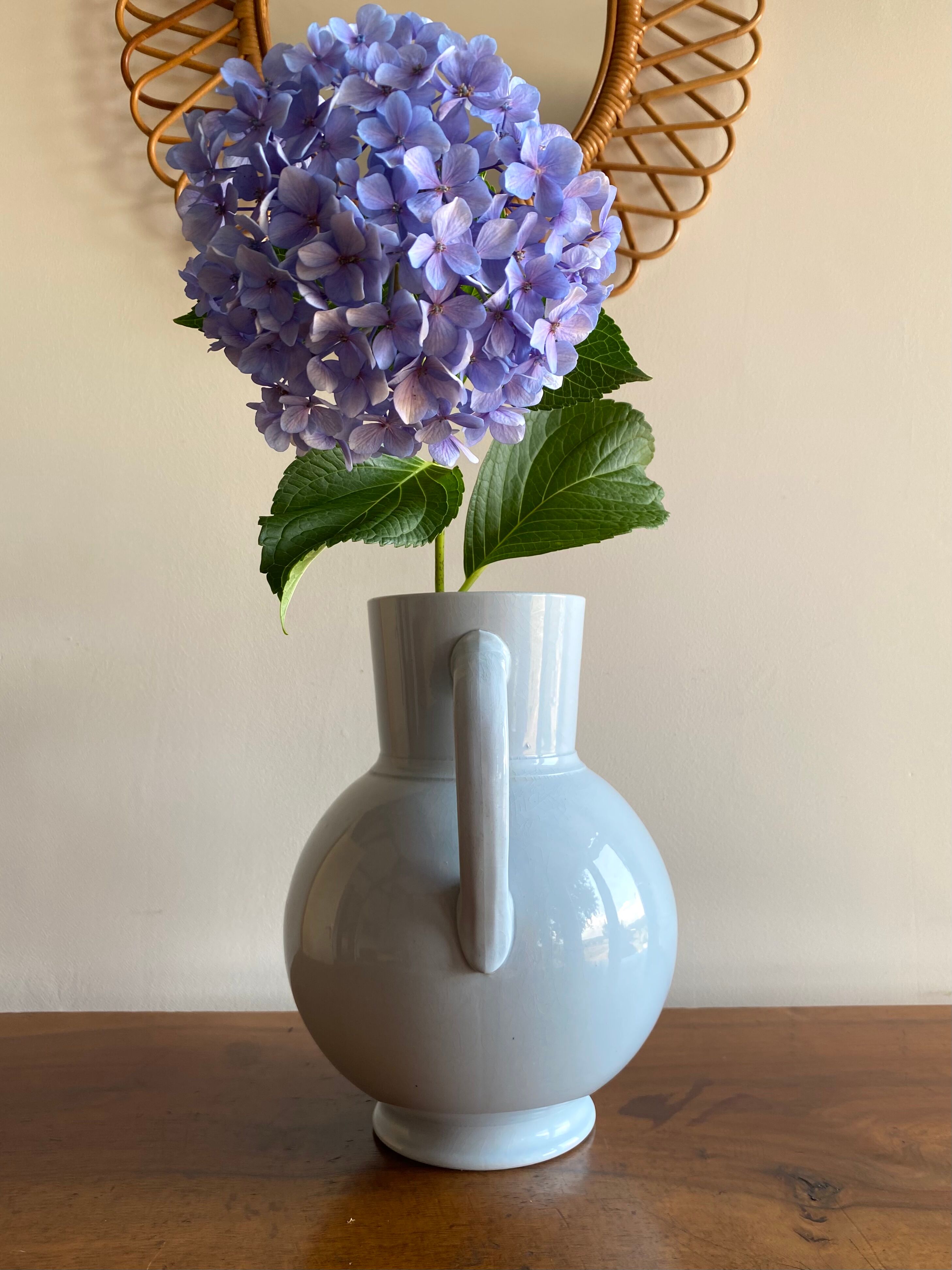 Antique vase in pale blue ceramic