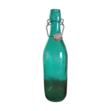 Bottle with green lemonade