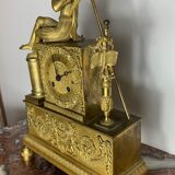 Period clock restoration in gilded bronze