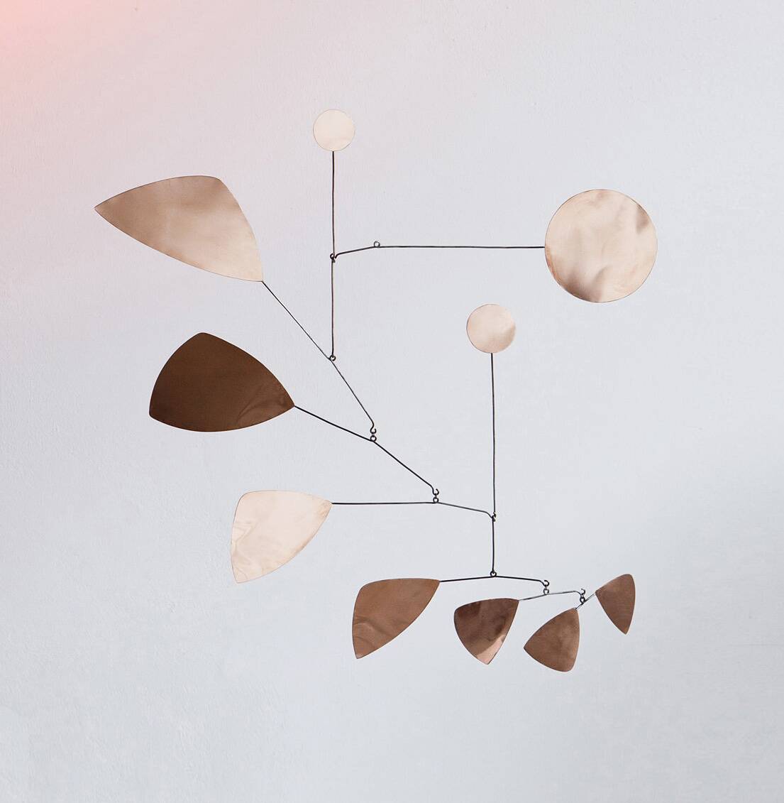 Mobile sculpture in brass and iron
